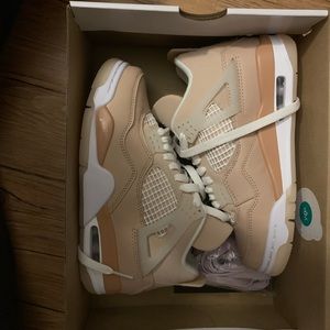 Size 5 women Jordan 4 retro shimmers